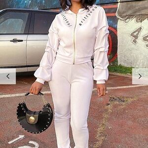 Chic White Ruffled Jumpsuit by Gritty Soul.  Never worn